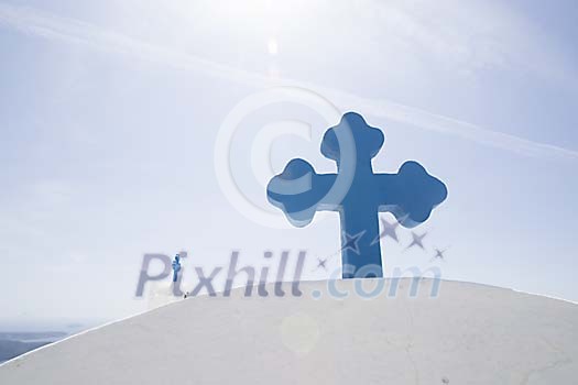 Blue cross on a white roof Blue cross on a white roof