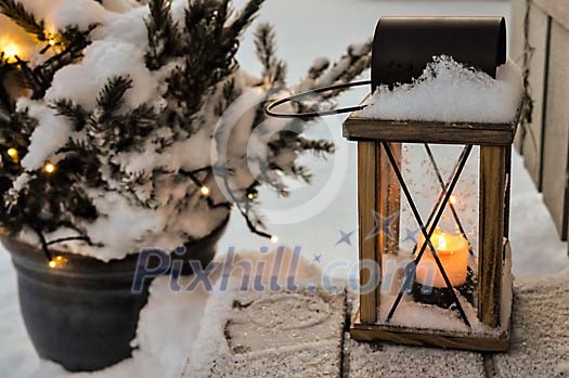 Snowy lantern on the stairs