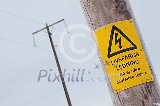Power line warning sign