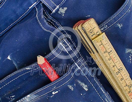 Folding ruler and pencil in the pockets