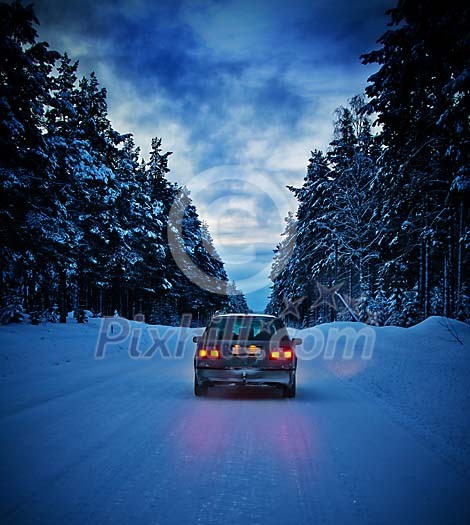 Car on winter road in the forest Car on winter road in the forest