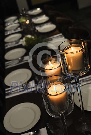 Dinner table with plates and utensils