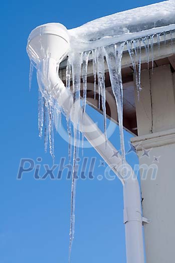 Long icicles hanging from the eaves