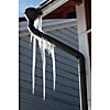 Spring icicles hanging from rainspout