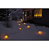 Candles lightning a path to the house