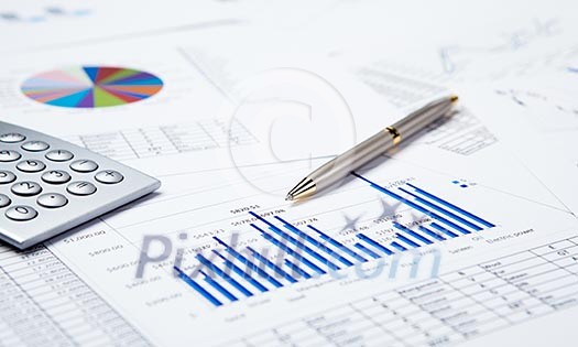 financial charts and graphs on the table