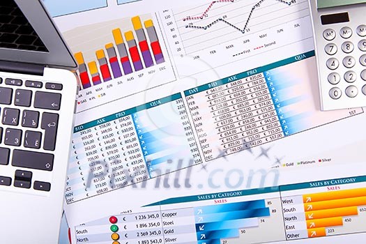 Graphs, charts, business table. The workplace of business people.