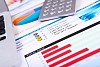 Graphs, charts, business table. The workplace of business people.