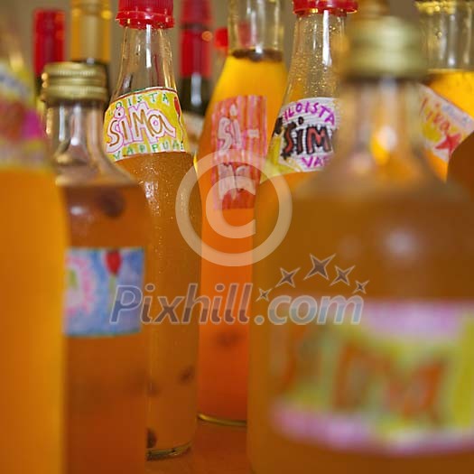 Bottles of Sima standing on table. Bottles of Sima standing on table.