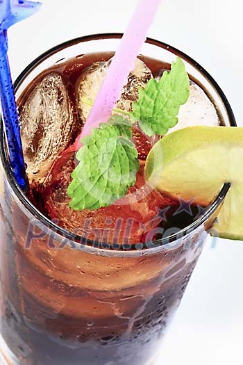 Closeup of a cola drink with ice cubes Closeup of a cola drink with ice cubes