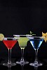 Coloured drinks on a black background