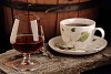 Glass of cognac and a cup of coffee