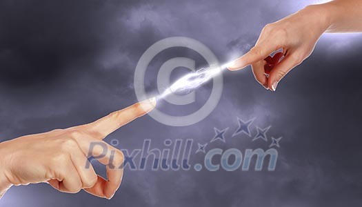 Two human hands in contact with bright flash Two human hands in contact with bright flash