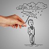 Man standing under the rain and protected with umbrella