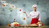 Asian female cook with knife cutting fruits and vegetables in air