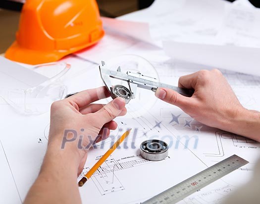 construction drafts and tools on the table