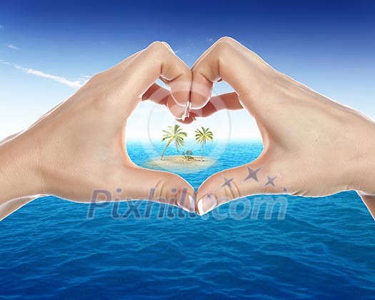 Collage with human hands and tropical island against blue sky