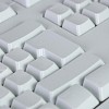 white computer keyboard with white blank buttons