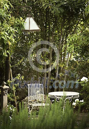 Table and a chair in the garden