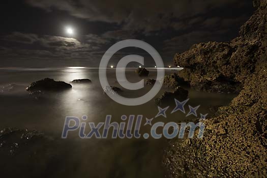 Moonlight over the coastline Moonlight over the coastline