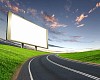 blank white billboard on the edge of country road