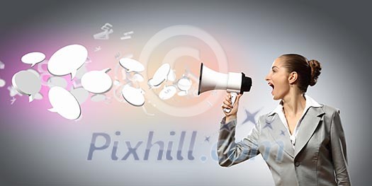 businesswoman in grey suit screaming into megaphone businesswoman in grey suit screaming into megaphone