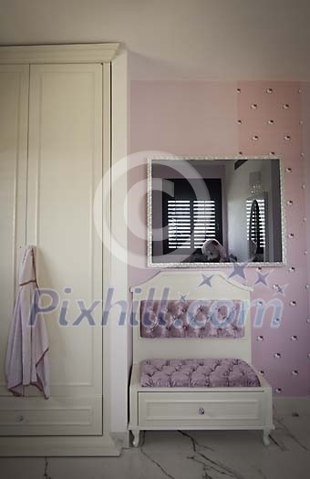 Inside of a pink children room Inside of a pink children room