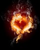 burning heart with flames against dark background