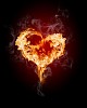 burning heart with flames against dark background