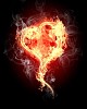 burning heart with flames against dark background