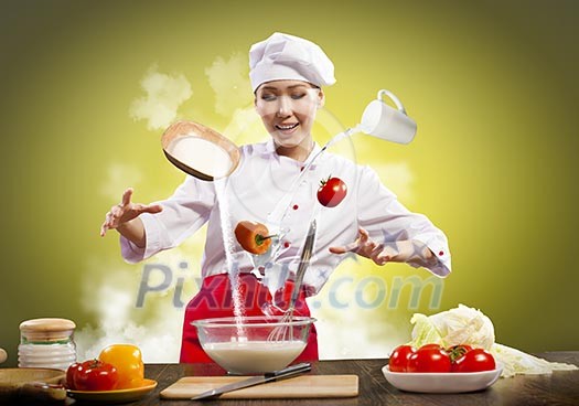 Asian female cooking with magic against color background