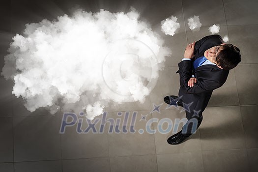 Top view of young businessman making decision with place for text Top view of young businessman making decision with place for text