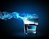 Image of glass of blue cocktail with fume going out