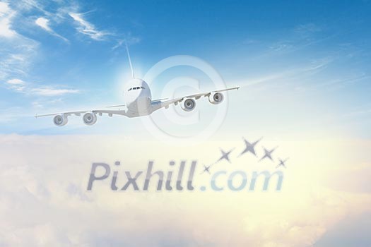 Image of flying airplane in sky with clouds at background Image of flying airplane in sky with clouds at background