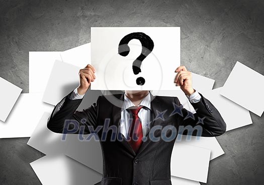 Image of businessman holding message board against face. Conceptual photo