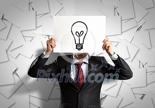 Image of businessman holding message board against face. Conceptual photo Image of businessman holding message board against face. Conceptual photo