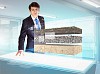 Image of young businessman looking at high-tech picture of topsoil