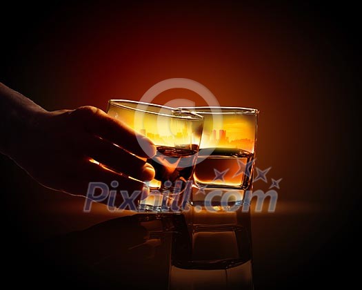 Image of two glasses of whiskey with city illustration in Image of two glasses of whiskey with city illustration in