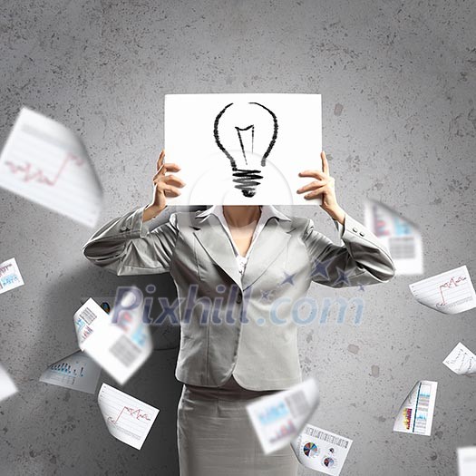 Image of businesswoman holding message board against face. Conceptual photo