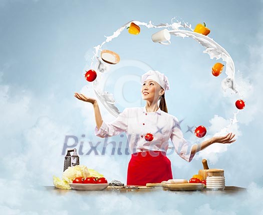 juggler female asian cook against color background