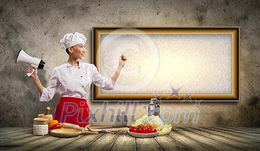 Asian female cook holding megaphone with space for text