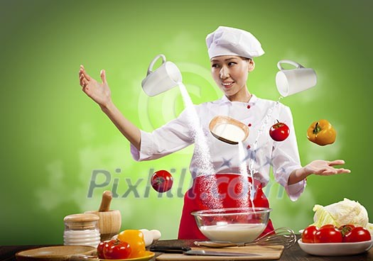 Asian female cooking with magic against color background