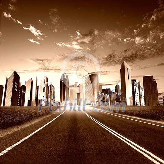 Image of a modern city and road leading to it Image of a modern city and road leading to it