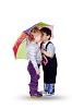 little boy and little girl together under the umbrella of color. On a white background.
