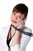 charming brunette business woman in a white jacket with black beads