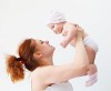 Portrait of a young child and his mother a white background. Baby.