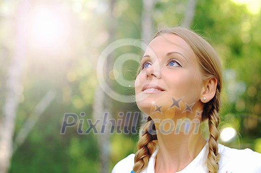 Young beautiful girl in a summer forest Young beautiful girl in a summer forest