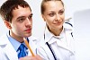 Group of doctors in uniforms together in clinic