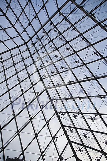 Inside the glass pyramid at the Louvre in Paris