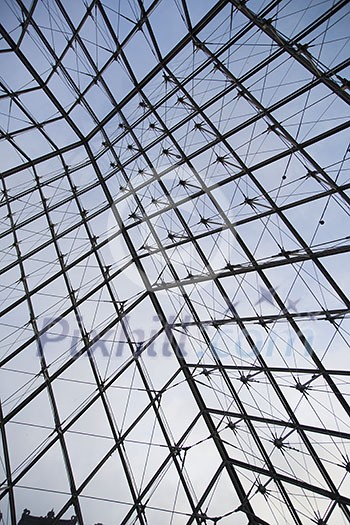 Inside the glass pyramid at the Louvre in Paris Inside the glass pyramid at the Louvre in Paris